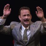 Actor Tom Hanks gestures to the audience after his performance in the premiere of the play Lucky Guy in New York, April 1, 2013. REUTERS/Lucas Jackson