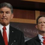 Senator Pat Toomey (R-PA) (R) and Senator Joe Manchin (D-W.VA) (L) hold a news conference on background checks for firearms on Capitol Hill in Washington April 10, 2013. REUTERS/Gary Cameron (UNITED STATES - Tags: POLITICS CRIME LAW)