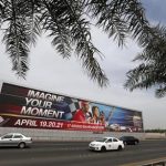Vehicles travel past a large Bahrain Formula One advertising billboard on main highway leading to Bahrain Internaitonal Circuit, in Manama April 9, 2013. B REUTERS/Hamad I Mohammed