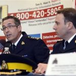 RCMP Chief Superintendent Gaeten Courchesne (L) speaks during a news conference as Assistant Commissioner James Malizia (R) looks on in Toronto, Ontario, April 22, 2013. REUTERS/Aaron Harris (CANADA - Tags: CRIME LAW TRANSPORT CIVIL UNREST)