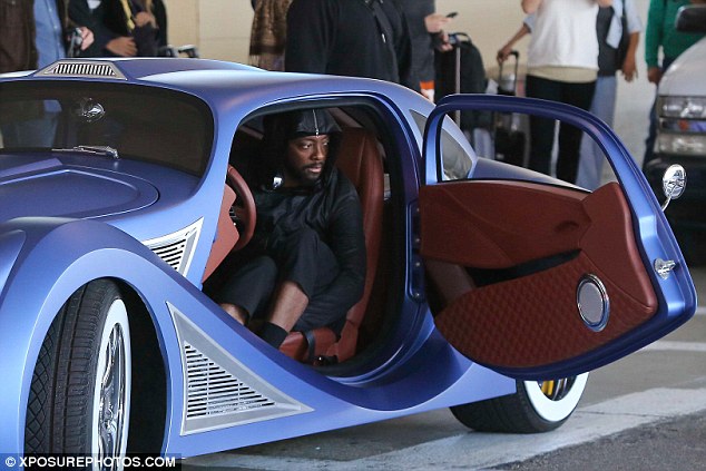 You certainly can't miss him! Will.i.am cruises out of LAX  in his extravagent $900,000 custom-built blue car