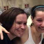 Amanda Berry, right, hugs her sister Beth Serrano after being reunited in a Cleveland hospital Monday May 6, 2013. Berry and two other women were found in a house near downtown Cleveland Monday after being missing for about a decade. (AP Photo/Family Handout courtesy WOIO-TV)