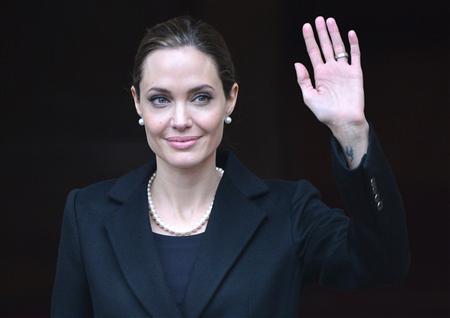 U.S. actress and humanitarian campaigner Angelina Jolie leaves a G8 Foreign Ministers Meeting in London in this April 11, 2013 file photo. REUTERS/Toby Melville/Files