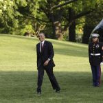 U.S. President Barack Obama smiles as he walks on the South Lawn of the White House upon his return to Washington from Costa Rica May 4, 2013. REUTERS/Yuri Gripas