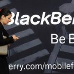 A woman uses her mobile phone at the Blackberry World Event in Orlando May 1, 2012. REUTERS/David Manning