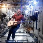 Canadian astronaut and International Space Station (ISS) Commander Chris Hadfield performs his zero-gravity version of David Bowie's hit "Space Oddity" in this image taken from video, courtesy of Chris Hadfield, NASA and CSA. The video, with its familiar refrain "Ground Control to Major Tom," had more than 1.5 million hits on YouTube early afternoon on May 13, 2013, and was being touted as the first music video ever filmed in space. REUTERS/Chris Hadfield, NASA and CSA/Handout via Reuters