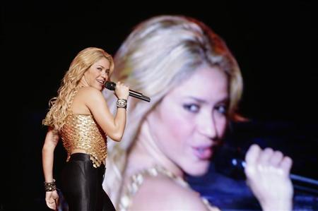Colombian pop star Shakira performs during her concert in Caracas, March 27, 2011. Shakira is currently on her The Sun Comes Out World Tour. REUTERS/Gil Montano
