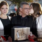Director Abdellatif Kechiche (C) poses with actresses Lea Seydoux (L) and Adele Exarchopoulos (R) during a photocall after he received the Palme d'Or award for the film "La Vie D'Adele" at the closing ceremony of the 66th Cannes Film Festival in Cannes May 26, 2013. REUTERS/Regis Duvignau