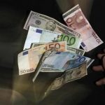 Euro and U.S. dollar banknotes are seen in this picture illustration taken in Prague January 23, 2013. REUTERS/David W Cerny