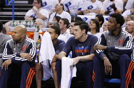 From left, Oklahoma City Thunder's Derek Fisher, Kevin Martin, Nick Collison and Hasheem Thabeet watch during the first half of Game 5 of an NBA basketball playoffs Western Conference semifinal against the Memphis Grizzlies, in Oklahoma City, Wednesday, May 15, 2013. (AP Photo/Alonzo Adams)
