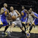 San Antonio Spurs guard Tony Parker (2nd L) drives on Golden State Warriors guard Jarrett Jack (L) as center Festus Ezeli (2nd R) and forward Carl Landry defend during the second half of their NBA Western Conference quarterfinal playoff basketball game in San Antonio, Texas May 8, 2013. REUTERS/Mike Stone