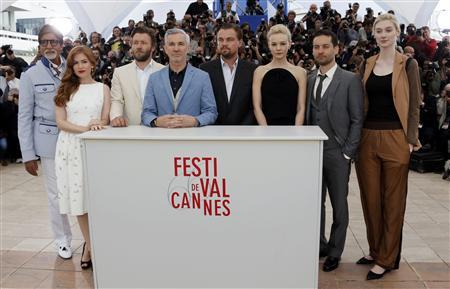 From L to R: Cast members Amitabh Bachchan, Isla Fisher, Joel Edgerton, director Baz Luhrmann, cast members Leonardo DiCaprio, Carey Mulligan, Tobey Maguire and Elizabeth Debicki pose during a photocall for the film 'The Great Gatsby' before the opening of the 66th Cannes Film Festival in Cannes May 15, 2013. REUTERS/Eric Gaillard
