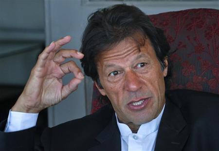 Imran Khan, Pakistani cricketer turned politician, speaks during an interview at his residence in Islamabad November 16, 2011. REUTERS/Mian Khursheed