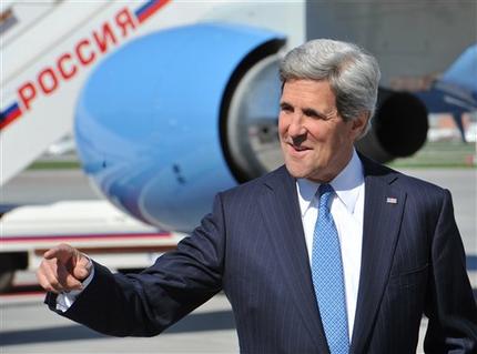 U.S. Secretary of State John Kerry arrives at Moscow Vnukovo Airport on Tuesday, May 7, 2013. U.S. Secretary of State Kerry will start his visit to Russia on Tuesday by laying a wreath at the Tomb of the Unknown Soldier near the Kremlin Wall and meeting with World War II veterans. (AP Photo/ Mladen Antonov, Pool)
