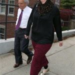 FILE - In this April 29, 2013 file photo, Katherine Russell, wife of Boston Marathon bomber suspect Tamerlan Tsarnaev, right, leaves the law office of DeLuca and Weizenbaum with Amato DeLuca, in Providence, R.I. Relatives of Tsarnaev, the older of the brothers suspected in the Boston Marathon bombing, will claim his body now that his wife has agreed to release it, an uncle said as officials in the U.S. and Russia deepened their investigations into him. (AP Photo/Stew Milne, File)
