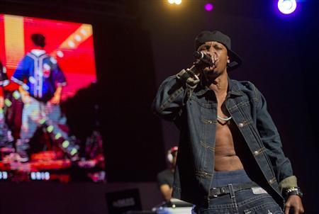 Chris Kelly of Kris Kross performs on stage at the Fox Theatre in Atlanta, Georgia during the So So Def 20th Anniversary Concert, in this photo taken February 23, 2013. REUTERS/Jonathan Phillips