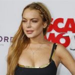 Actress Lindsay Lohan arrives at the premiere of the film "Scary Movie 5" in Hollywood April 11, 2013. REUTERS/Fred Prouser