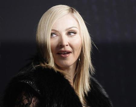 Singer Madonna arrives at the 2011 Vanity Fair Oscar party in West Hollywood, California February 27, 2011. REUTERS/Danny Moloshok