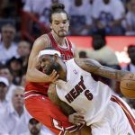 Miami Heat's LeBron James (6) drives past Chicago Bulls' Joakim Noah during the fourth quarter in Game 5 of their NBA Eastern Conference semi-final basketball playoff in Miami, Florida May 15, 2013. REUTERS/Joe Skipper