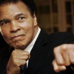 U.S. boxing great Muhammad Ali poses during the Crystal Award ceremony at the World Economic Forum (WEF) in Davos, Switzerland January 28, 2006. REUTERS/Andreas Meier