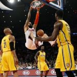 New York Knicks' Tyson Chandler (C) dunks past Indiana Pacers' David West (L) and Roy Hibbert (R) during the second quarter in Game 2 of their NBA Eastern Conference playoff basketball series in New York May 7, 2013. The Knicks won the game 105-79. REUTERS/Mike Segar