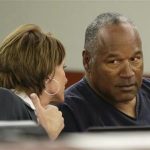 O.J. Simpson (R) sits with his attorney, Patricia Palm in Clark County District Court during his evidentiary hearing in Las Vegas, Nevada May 13, 2013. REUTERS/Julie Jacobson/Pool