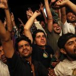 Supporters of the Pakistan Muslim League - Nawaz (PML-N) celebrate in front of a party office as results of the general election come in, in Lahore May 11, 2013. Former Prime Minister Nawaz Sharif said on Saturday his PML-N party was the clear winner in Pakistan's general election and that he hoped for a majority to avoid a coalition. REUTERS/Damir Sagolj