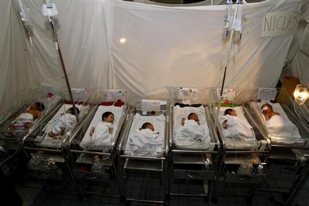 Premature babies lie on their cribs at the Fabella government maternity hospital in Manila August 5, 2012. REUTERS/Erik De Castro