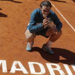 Rafael Nadal of Spain poses with the Ion Tiriac's trophy after winning the Madrid Open final tennis match against Stanislas Wawrinka of Switzerland in Madrid, May 12, 2013. REUTERS/Juan Medina