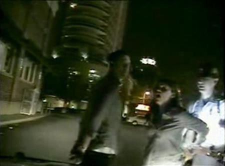 Actress Reese Witherspoon (2nd R) is pictured being arrested along with her husband Jim Toth (L) in Atlanta, Georgia in this still image from a April 19, 2013 video released by the Georgia State Patrol on May 3, 2013. Witherspoon has pleaded no contest to a charge of disorderly conduct and paid a $100 fine. Toth, 42, entered a guilty plea to drunk driving and received a $600 fine. He must also complete 40 hours of community service. REUTERS/Georgia State Patrol/Handout via Reuters