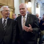 Sen. Patrick Leahy, D-Vt., president pro tempore of the Senate, right, and Sen. Thad Cochran, R-Miss., left, walk to the floor of the Senate during a vote on legislation to collect sales tax on Internet purchases, on Capitol Hill in Washington, Monday, May 6, 2013. (AP Photo/J. Scott Applewhite)