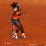 Serena Williams of the U.S. celebrates her victory against Lourdes Dominguez Lino of Spain during their women's singles match at the Madrid Open tennis tournament, May 7, 2013. REUTERS/Juan Medina