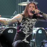 FILE - In this file photo taken Thursday, April 8, 2010, Tim Lambesis of As I Lay Dying performs at the second annual Revolver Golden Gods Awards in Los Angeles. Authorities say the singer of Grammy-nominated heavy metal band As I Lay Dying has been arrested Tuesday May 7, 2013 in Southern California after trying to hire an undercover detective to kill his estranged wife. The San Diego County Sheriffs Department says in a statement that 32-year-old Tim Lambesis was arrested Tuesday in Oceanside. (AP Photo/Chris Pizzello, File)