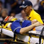 Toronto Blue Jays' J.A. Happ is attended to by medical personnel as he is taken off the field on a stretcher after being hit in the head by a line drive by Tampa Bay Rays' Desmond Jennings during the second inning of a baseball game Tuesday, May 7, 2013, in St. Petersburg, Fla. (AP Photo/Mike Carlson)