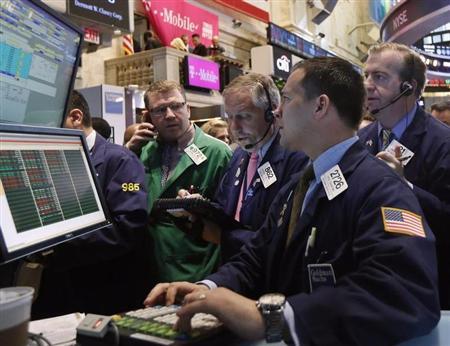 Traders work on the floor at the New York Stock Exchange, May 1, 2013. REUTERS/Brendan McDermid