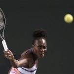 Venus Williams of the U.S. returns a shot to Kimiko Date-Krumm of Japan at the Sony Open tennis tournament in Key Biscayne, Florida March 21, 2013. REUTERS/Andrew Innerarity