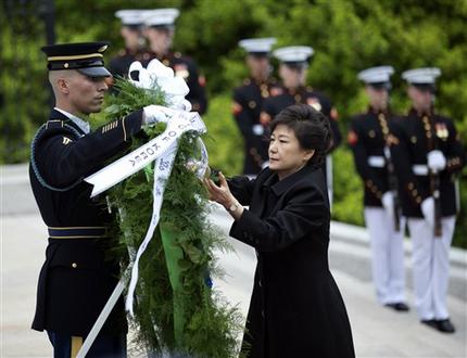 Visiting South Korea President Park Geun-hye, lays a wreath at the Tomb of the Unknowns at Arlington National Cemetery in Arlington, Va., Monday, May 6, 2013.  (AP Photo/Manuel Balce Ceneta)