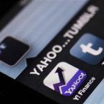 A photo illustration shows the applications of Yahoo and Tumblr on the screen of an iPhone in Zagreb May 20, 2013. REUTERS/Antonio Bronic