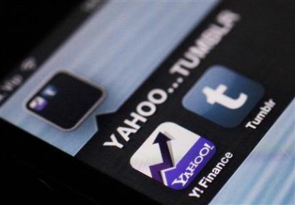 A photo illustration shows the applications of Yahoo and Tumblr on the screen of an iPhone in Zagreb May 20, 2013. REUTERS/Antonio Bronic