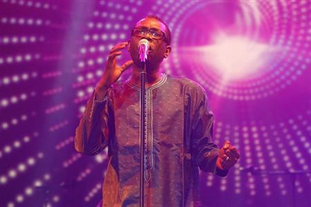 Singer Youssou N'Dour performs at a concert called "Africa Celebrates Democracy" that pays tribute to Tunisian youth and the revolution that inspired the Arab Spring, in Tunis November 11, 2011. REUTERS/Anis Mili
