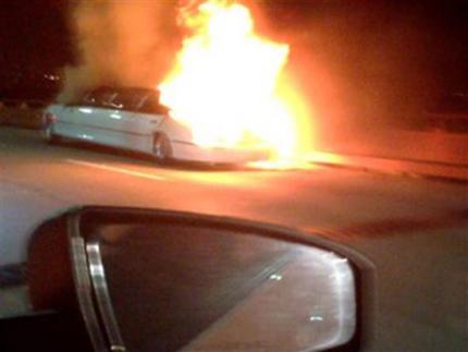 This frame grab taken from video provided by Roxana and Carlos Guzman shows a Limo on fire Saturday, May 4, 2013, on the San Mateo-Hayward Bridge in San Francisco. Five dead female bodies were found pressed up against the partition behind the driver, where they apparently tried to escape the smoke and fire that kept them from the rear exits of the extended passenger compartment. (AP Photo/Roxana and Carlos Guzman)