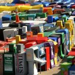 FILE-In this Friday, March 13, 2009, file photo, discarded newspaper racks clutter a storage yard in San Francisco. The report released Monday, May 13, 2013, revealing that the financial data and news company Bloomberg LP leaked more than 10,000 of its clients' private messages containing sensitive pricing data, highlights the uncertain and rapidly changing ethical landscape facing media companies that are reinventing the news business. Bloomberg LP, which started as a provider of sophisticated financial data to bond traders and only later expanded to include a journalistic enterprise, echoes many new ventures in its determination to bypass old journalistic models that depended on well-defined relationships with readers and advertisers. (AP Photo/Noah Berger, File)