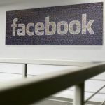 The Facebook logo is pictured in the Facebook headquarters in Menlo Park, California January 29, 2013. REUTERS/Robert Galbraith