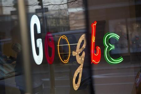 The Google signage is seen at the company's headquarters in New York January 8, 2013. REUTERS/Andrew Kelly