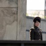 A North Korean soldier stands guard on the banks of Yalu River, near the North Korean town of Sinuiju, opposite the Chinese border city of Dandong, May 20, 2013. REUTERS/Jacky Chen