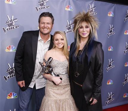 In this image provided by NBC Blake Shelton, Danielle Bradbery and Cher, right, pose after Bradbery won season-four of "The Voice" Tuesday June 18, 2013. Bradbery never had a big singing gig or a vocal lesson. It's also the third win for her coach Blake Shelton.  (AP Photo/NBC, Trae Patton)