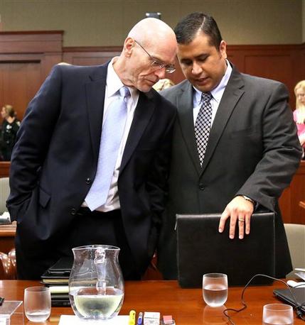 POOL - George Zimmerman, right, talks with defense attorney Don West in Seminole circuit court  in Sanford, Fla., Monday, June 24, 2013. Zimmerman has been charged with second-degree murder for the 2012 shooting death of Trayvon Martin. (AP Photo/Orlando Sentinel, Joe Burbank,Pool)