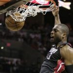 Miami Heat's Dwyane Wade (3) dunks against the San Antonio Spurs during the second half at Game 4 of the NBA Finals basketball series, Thursday, June 13, 2013, in San Antonio. (AP Photo/Eric Gay)