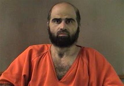 FILE - This undated file photo provided by the Bell County Sheriff's Department shows Nidal Hasan, the Army psychiatrist charged in the deadly 2009 Fort Hood shooting rampage that left 13 dead. Hasan will represent himself at his upcoming murder trial, meaning he will question the more than two dozen soldiers he's accused of wounding, a military judge ruled Monday, June 3, 2013.  (AP Photo/Bell County Sheriff's Department, File)