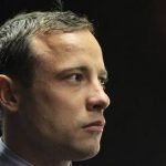 Double-amputee Olympian, Oscar Pistorius, looks on as he appears in the magistrates court in Pretoria, South Africa, Tuesday, June 4, 2013. Pistorius is back in the glare of public scrutiny for the first time in months when he appeared, launching the next chapter of a sensational case that transformed the double-amputee Olympian from a smiling global inspiration to a sobbing suspect facing a life sentence in prison if convicted of killing his girlfriend. (AP Photo/Themba Hadebe)